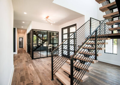 Home - Floating Stairs - Iron Railings